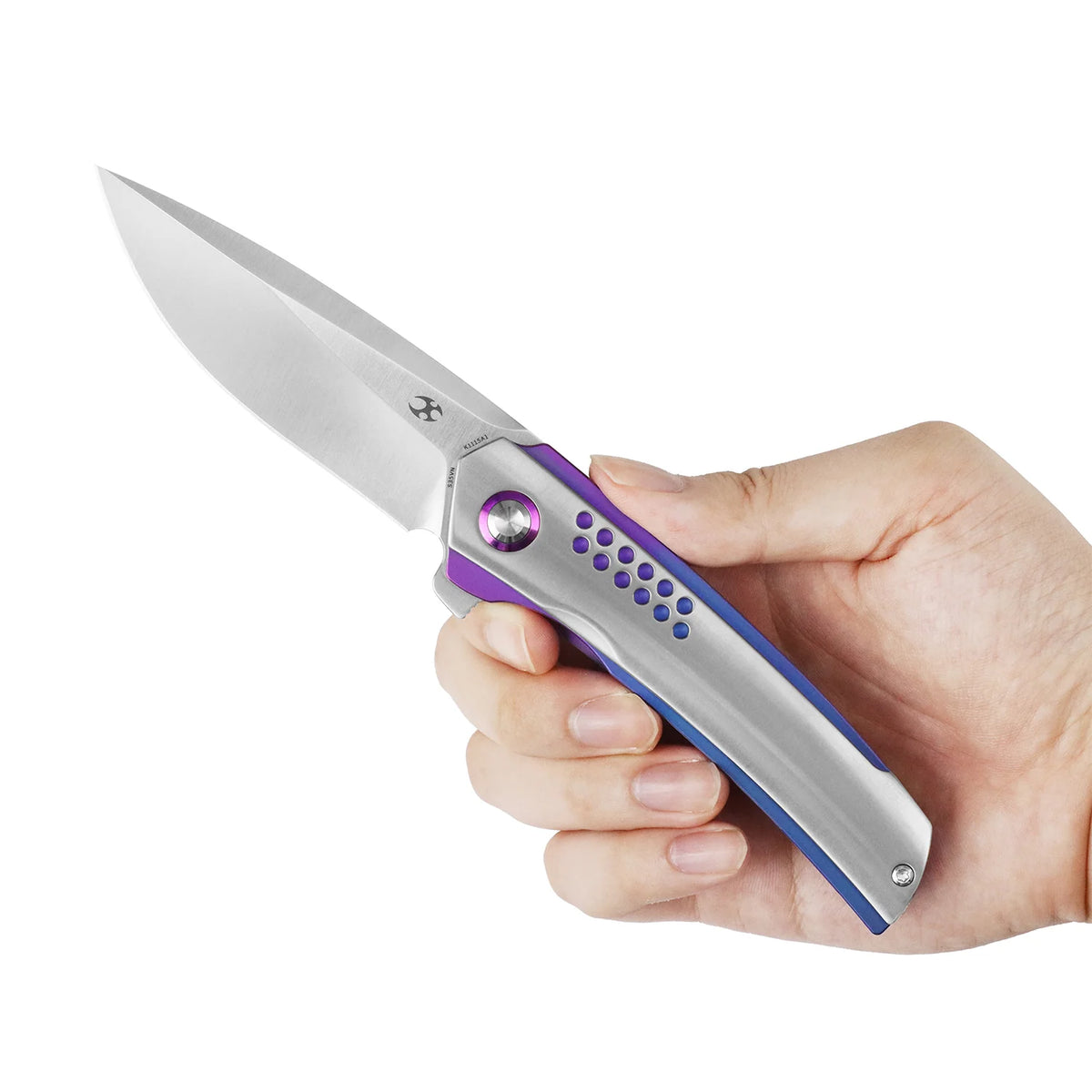 Kansept Tracer K1115A1 CPM-S35VN frame-lock folder with blue-purple anodized titanium, hand-held open view on a white background