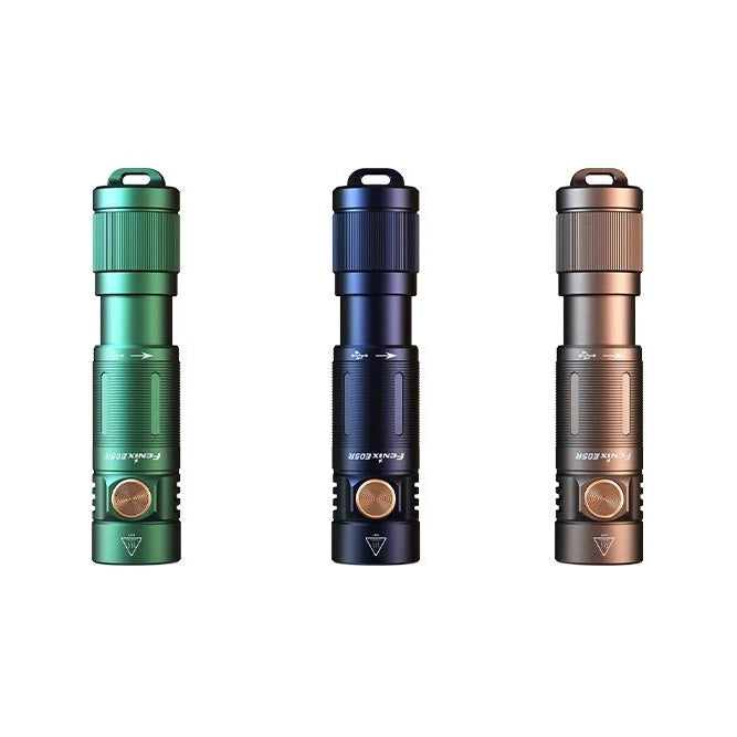 Fenix E05R Mini keychain flashlights in green, black and brown anodized finishes, shown upright with the LED heads visible