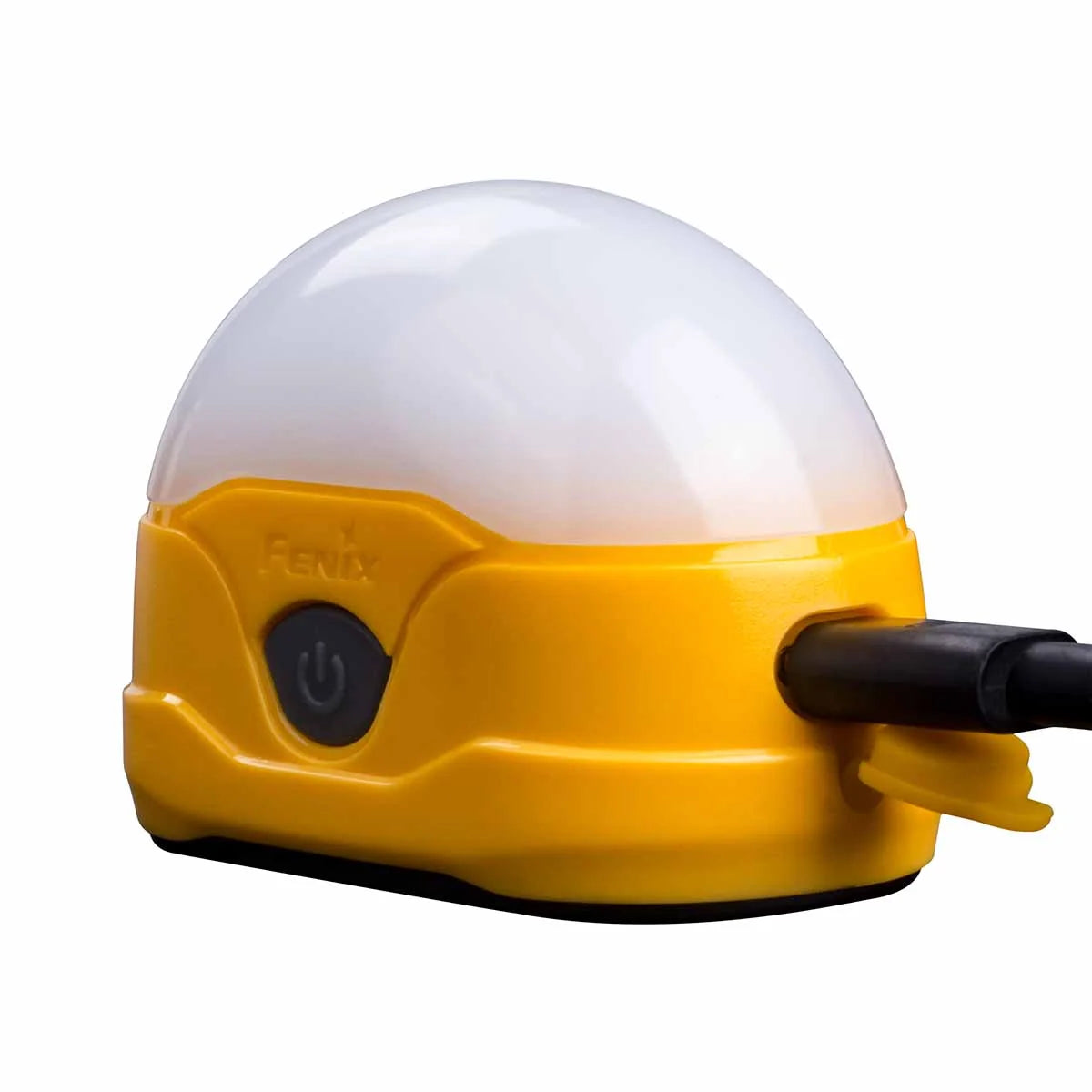 The Fenix CL20R lantern lit in warm white inside a tent, showing the even, glare-free diffused output of its LED array