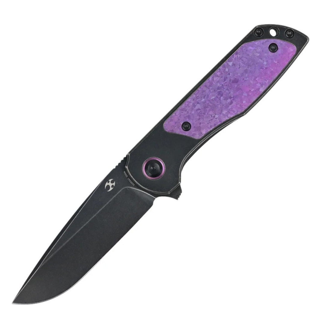 Open Kansept Ptarmigan K2055A3 drop point at a three-quarter angle showing the Blackwash CPM-S35VN blade and purple crystallized titanium handle