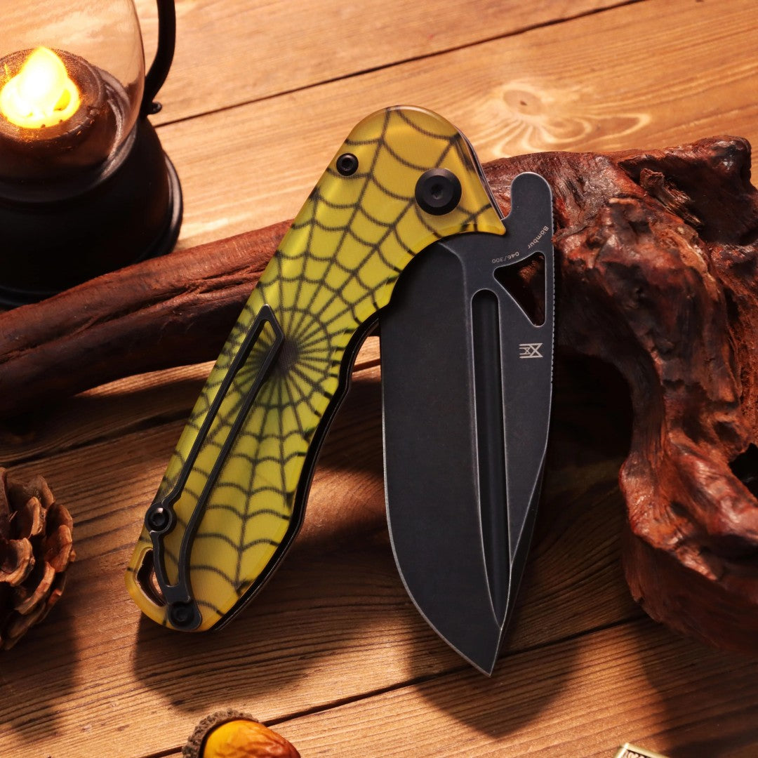 Closed front of the Bombur T1054A9 showing yellow spiderweb polycarbonate scales with blackwash blade half deployed