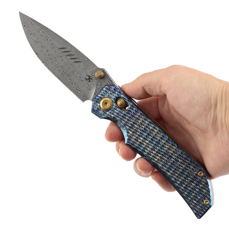 Navaja plegable Kansept Eaglestrike K1095V5 con hoja de Damasco, mango de titanio y cierre de barra transversal