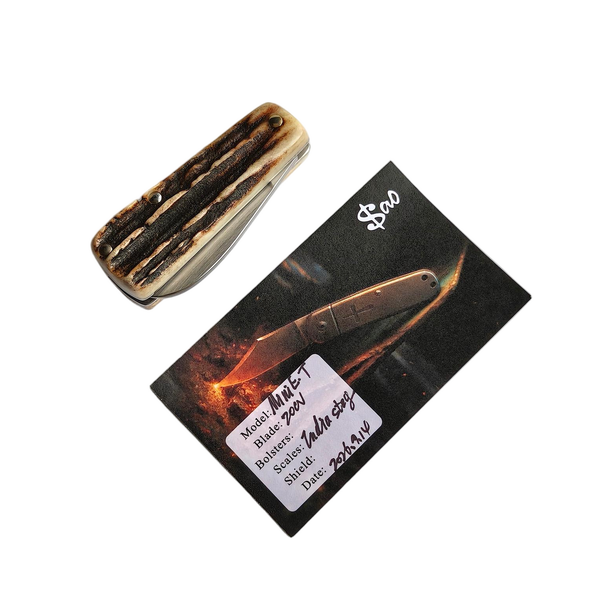 The Sao Knife Elephant with its Sao maker's information card listing the 20CV blade and India stag scales